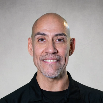 Alfredo Munoz in a black shirt.